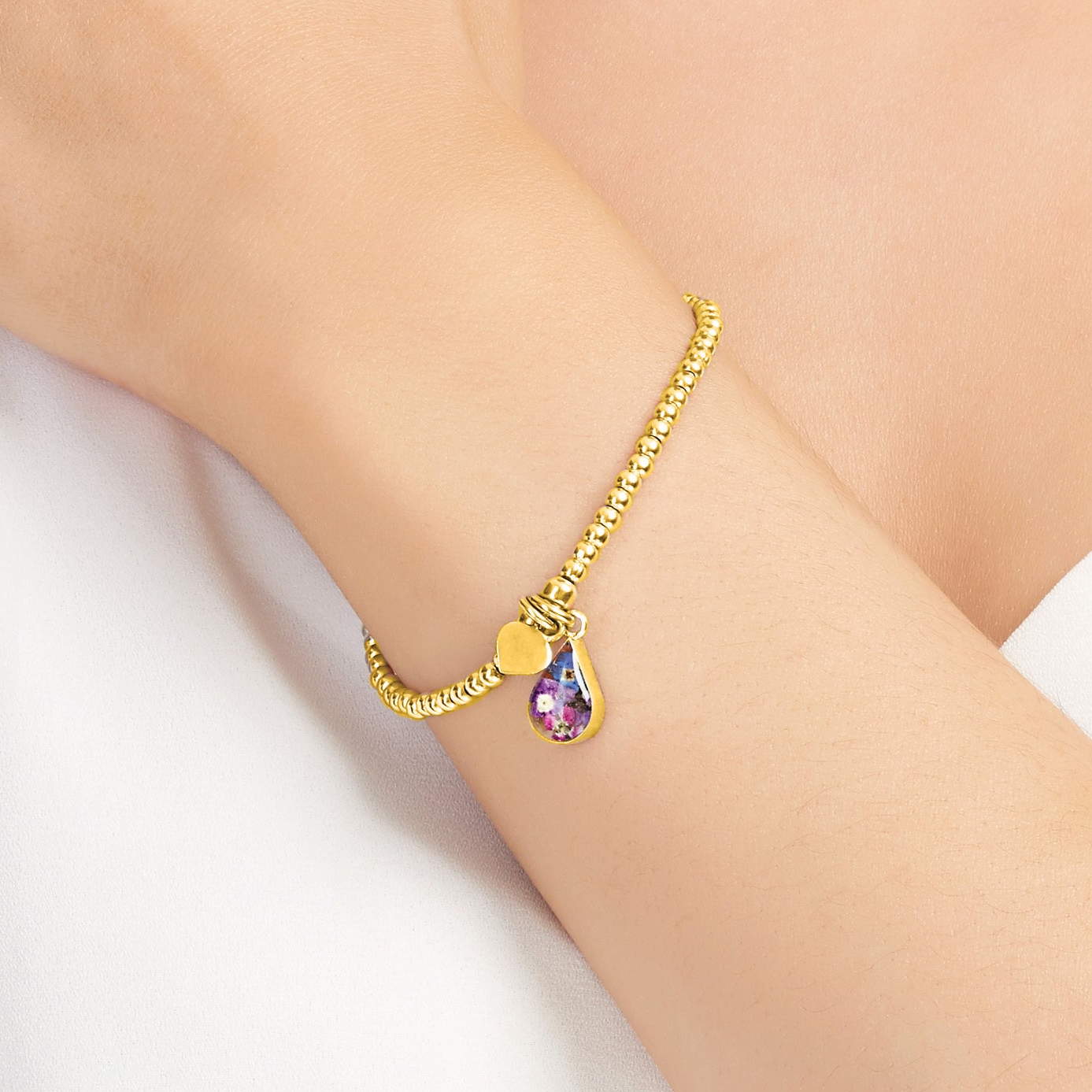Stretch bead bracelet. Gold plated sterling silver with Purple flowers by Shrieking Violet