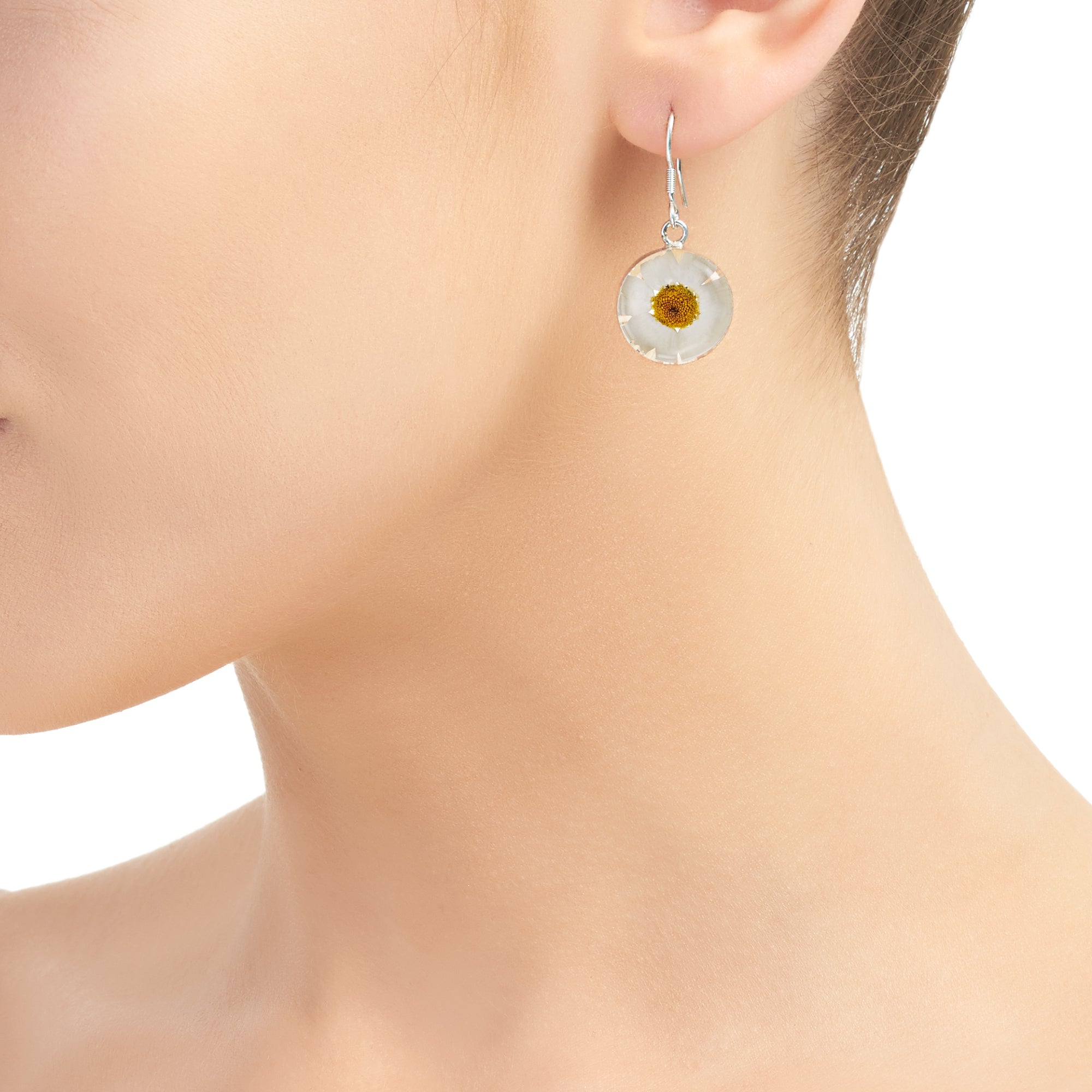 Daisy necklace by Shrieking Violet® Sterling silver & real daisy in a round pendant.