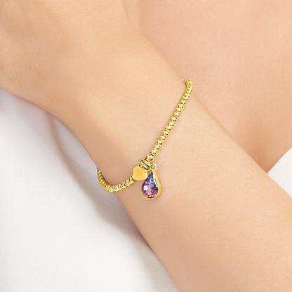 Stretch bead bracelet. Gold plated sterling silver with Purple flowers by Shrieking Violet